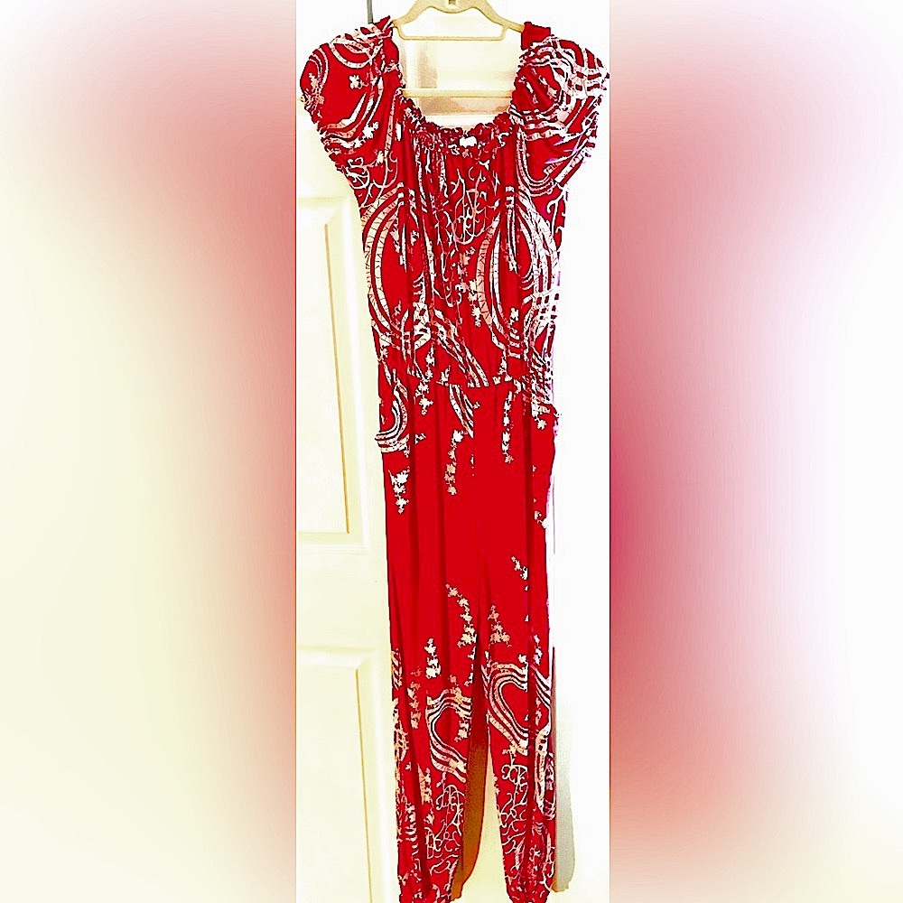 Women’s red floral silk blend jumpsuit. Size medium
